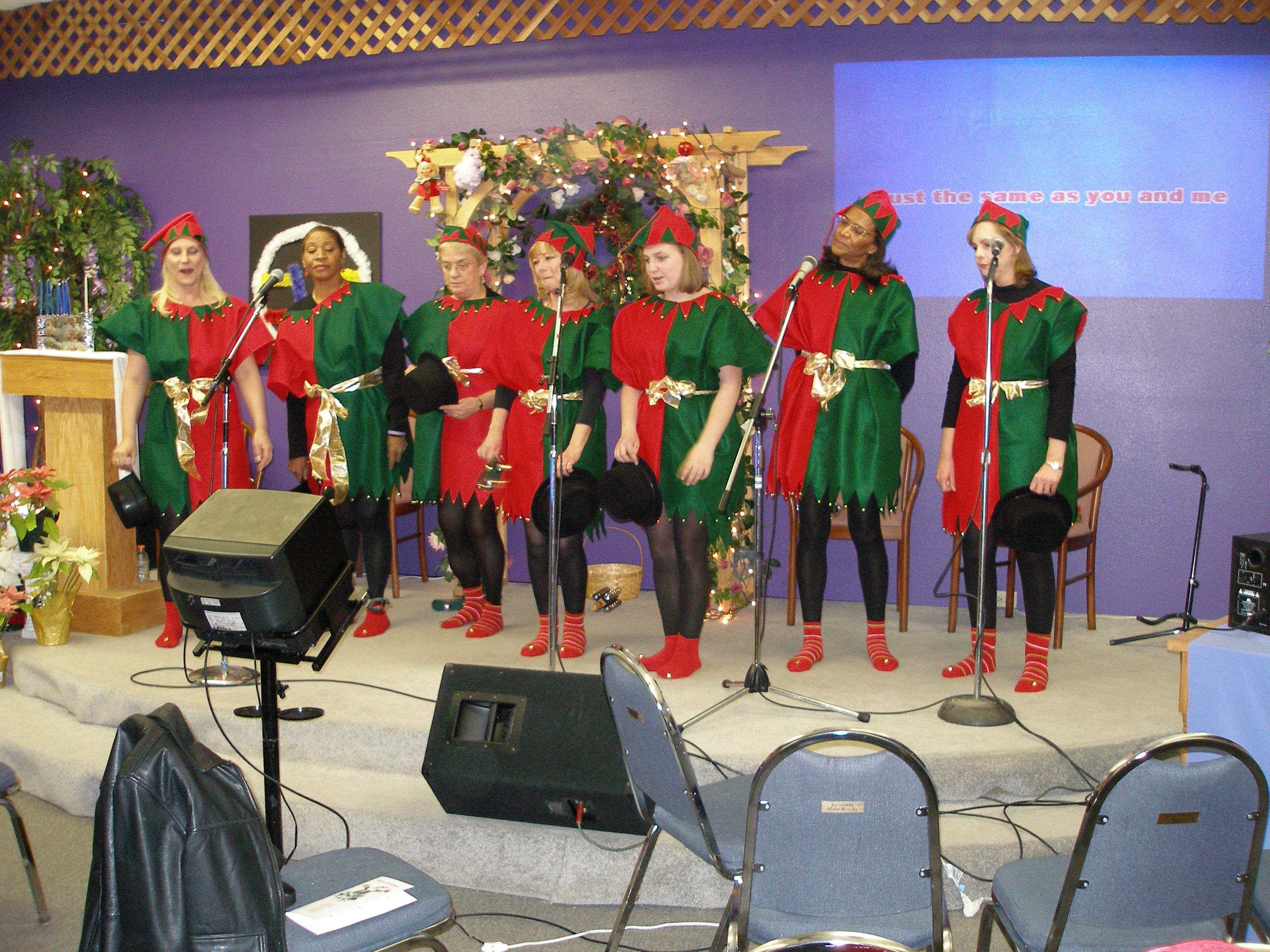 Christmas Eve 2008 elf carolers singing together