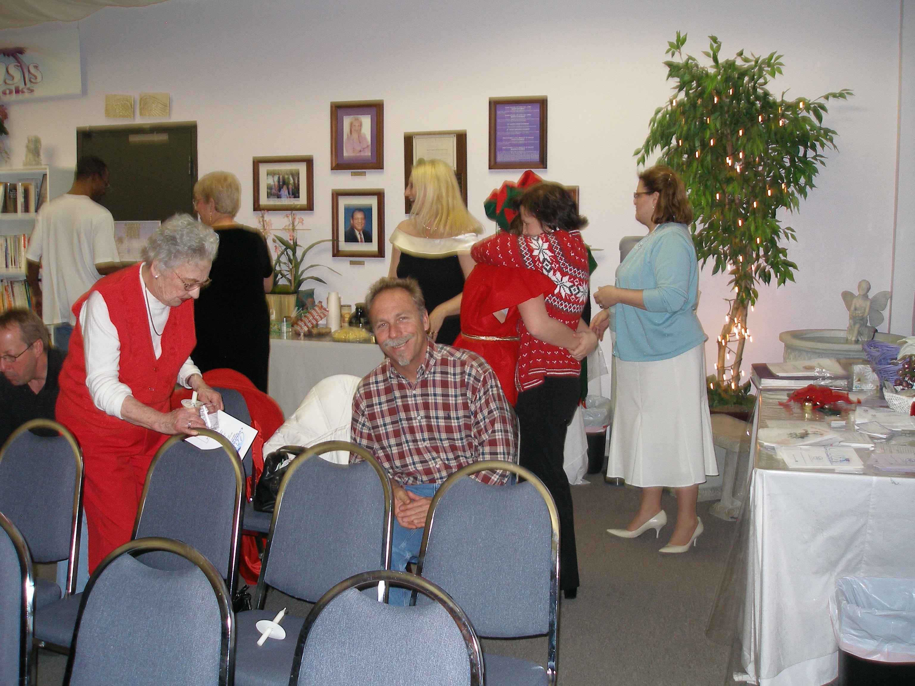 Community members mingling before the Christmas Eve 2008 service