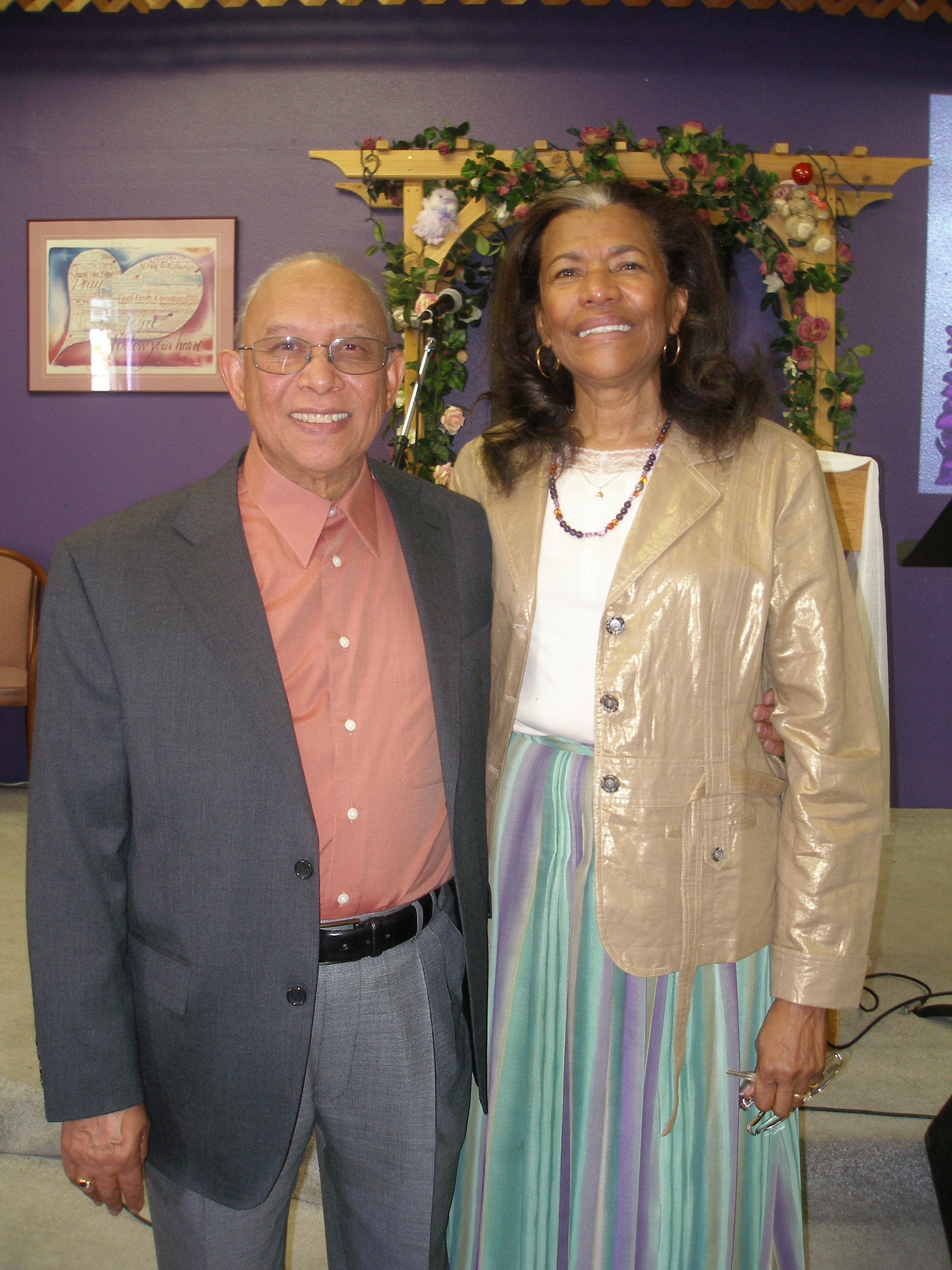 Couple posing in front of the Oasis CSL sanctuary