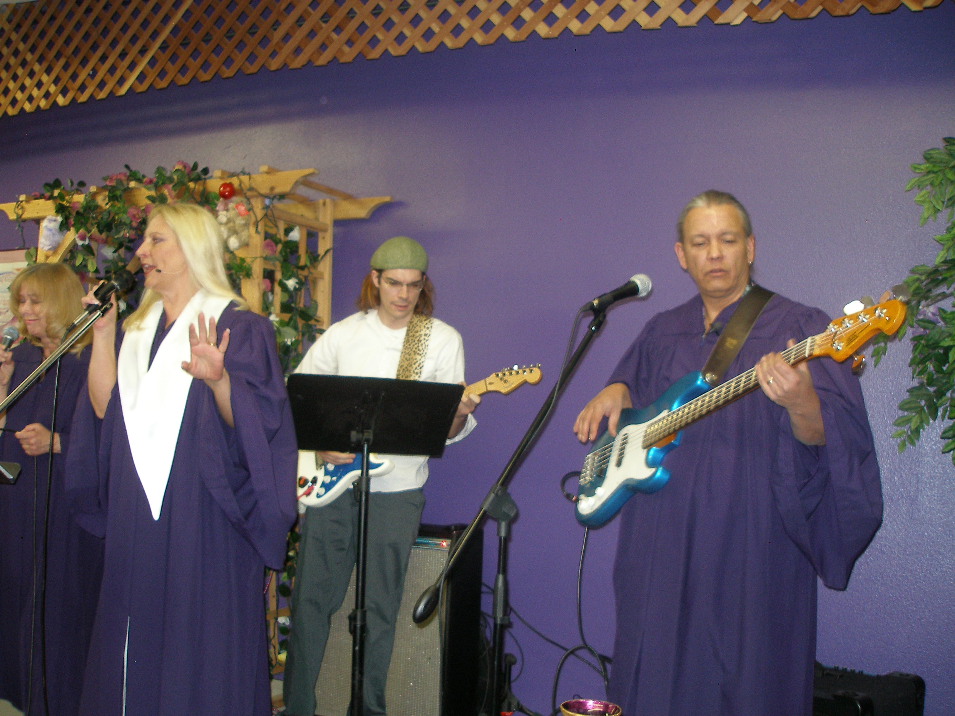 Choir and band performing at Rev. S. Tucker's ordination — wide stage view