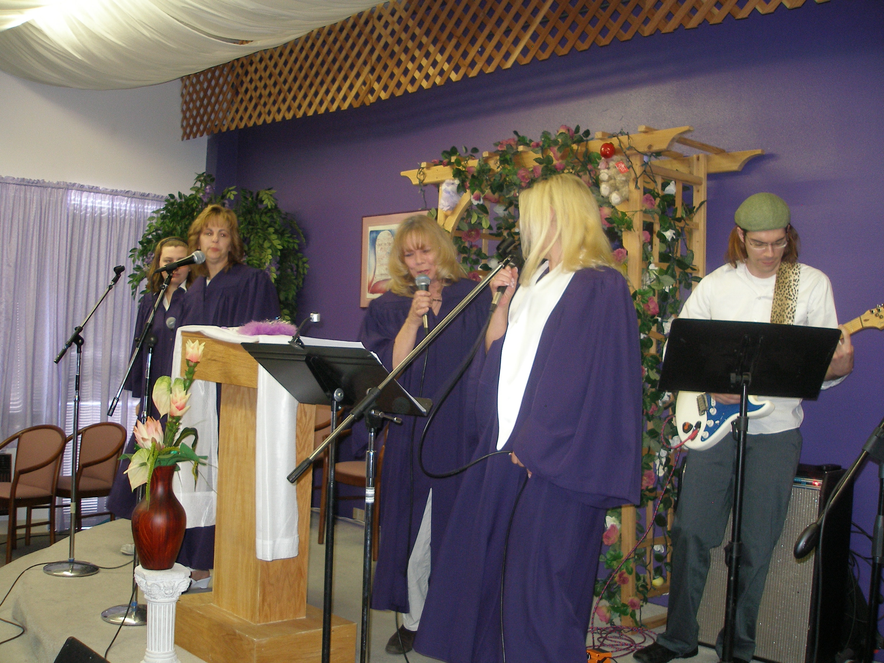Full choir ensemble with guitarist at Rev. S. Tucker's ordination